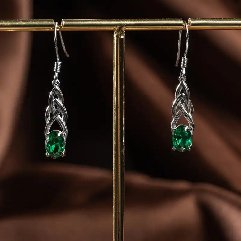 Celtic Magic™ Earrings — 18K White Gold | Oval Emerald